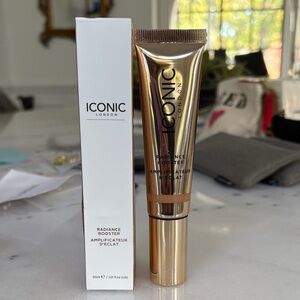 New Iconic London radiance booster in color caramel glow 1.01 ounce 30 ml
